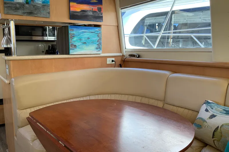 Slide: The Image of Interior of 1997 Carver 500 Cockpit Motor Yacht with cozy bedroom and steps. - 9