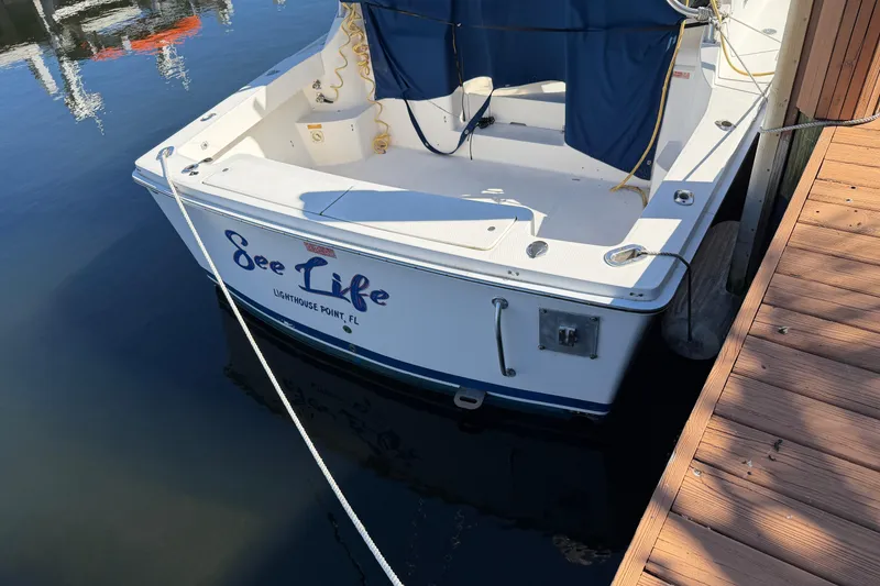 Slide: The Image of 2007 Luhrs 28 Open boat docked, named "See Life," at Lighthouse Point, FL. - 12