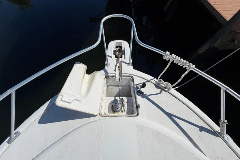 Slide: The Image of Bow view of 2007 Luhrs 28 Open boat with anchor and railing. - 18