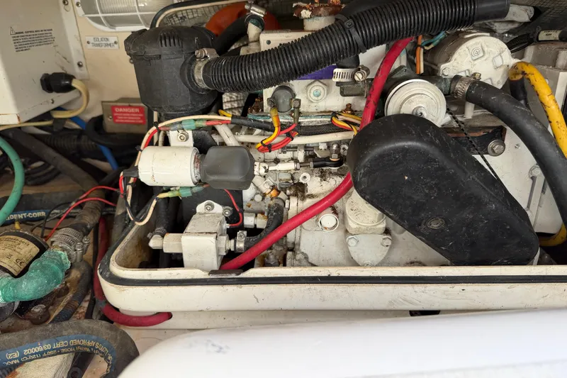 Slide: The Image of Engine compartment of a 2007 Luhrs 28 Open boat, showing wiring and components. - 40