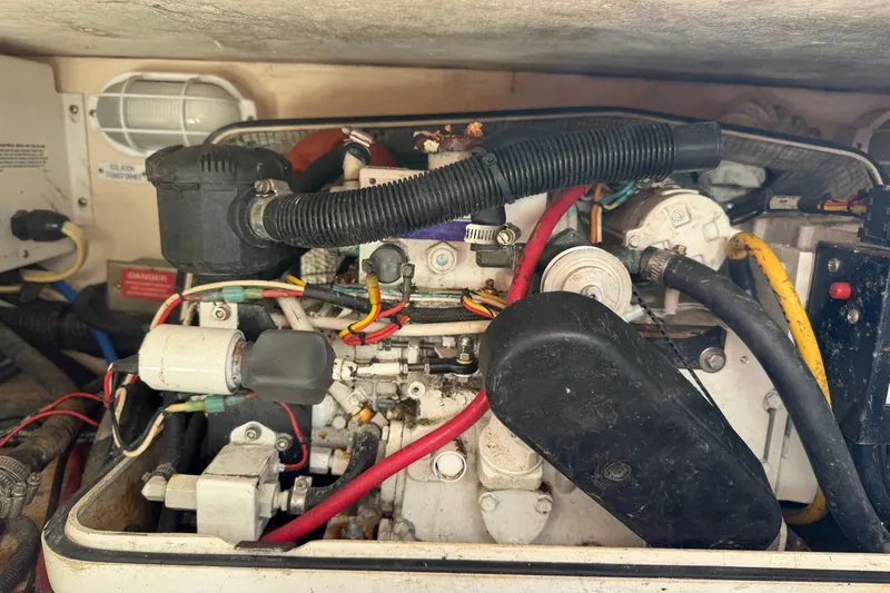 Slide: The Image of Engine compartment of a 2007 Luhrs 28 Open boat, showing wiring and components. - 41