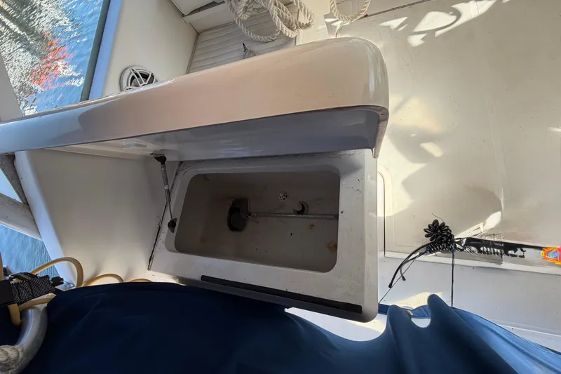 Slide: The Image of 2007 Luhrs 28 Open boat interior with open storage compartment. - 52