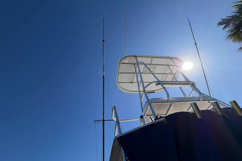 Slide: The Image of 2007 Luhrs 28 Open boat tower against clear blue sky. - 9