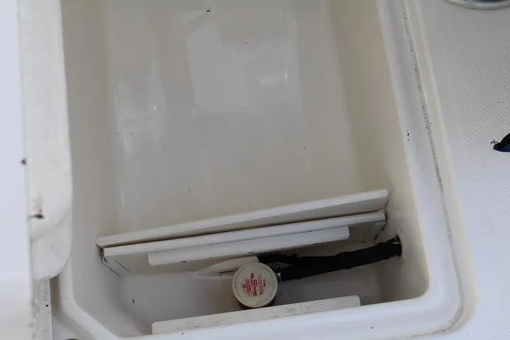 Slide: The Image of Empty storage compartment in 2010 Trophy 1802 Walkaround boat. - 21