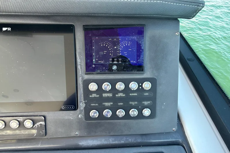 Slide: The Image of Control panel of a 2019 Monterey 385 Super Express boat with digital displays. - 15