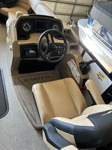 Slide: The Image of 2026 Evotti 521QL boat interior with steering wheel and dashboard. - 13