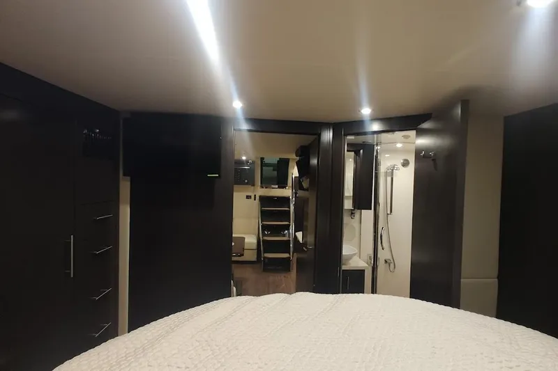 Slide: The Image of Interior of 2016 Regal 53 Sport Coupe, featuring modern design and luxurious amenities. - 18