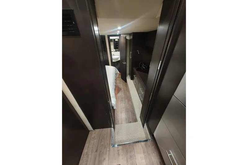 Slide: The Image of Interior hallway of 2016 Regal 53 Sport Coupe yacht with modern design. - 23