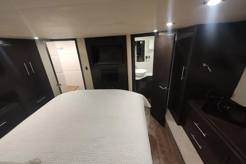 Slide: The Image of Luxurious interior of 2016 Regal 53 Sport Coupe with modern furnishings and elegant design. - 24