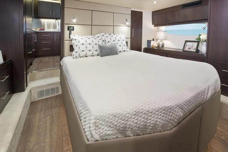 Slide: The Image of Luxurious interior of a 2016 Regal 53 Sport Coupe yacht with ambient lighting. - 9