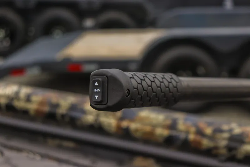 Slide: The Image of Close-up of Excel 1751 F4 trim control handle, 2026 model, with textured grip. - 10