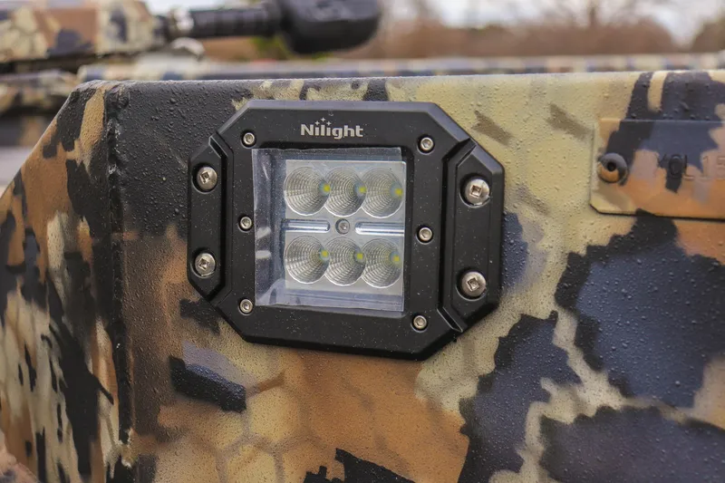 Slide: The Image of Camouflage-patterned Excel 1751 F4 (2026) with Nilight LED light detail. - 12