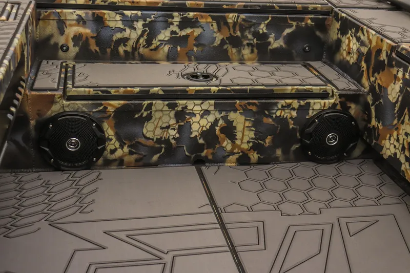 Slide: The Image of Camouflage interior of 2026 Excel 1751 F4 boat with speakers and textured flooring. - 14