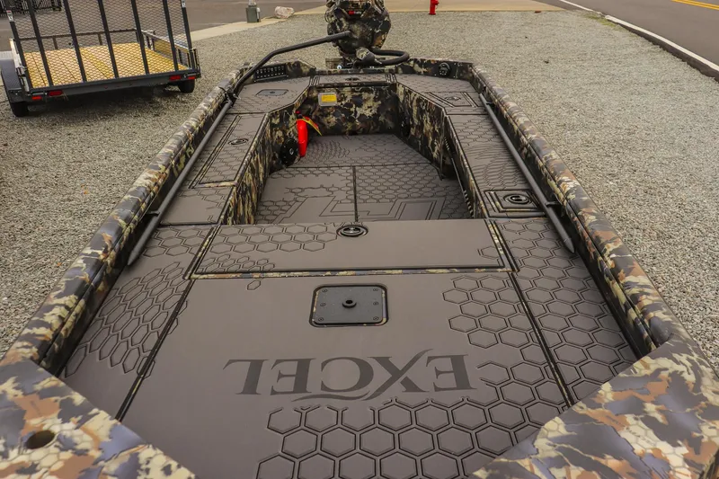 Slide: The Image of 2026 Excel 1751 F4 boat with camouflage design and hexagonal pattern flooring. - 8