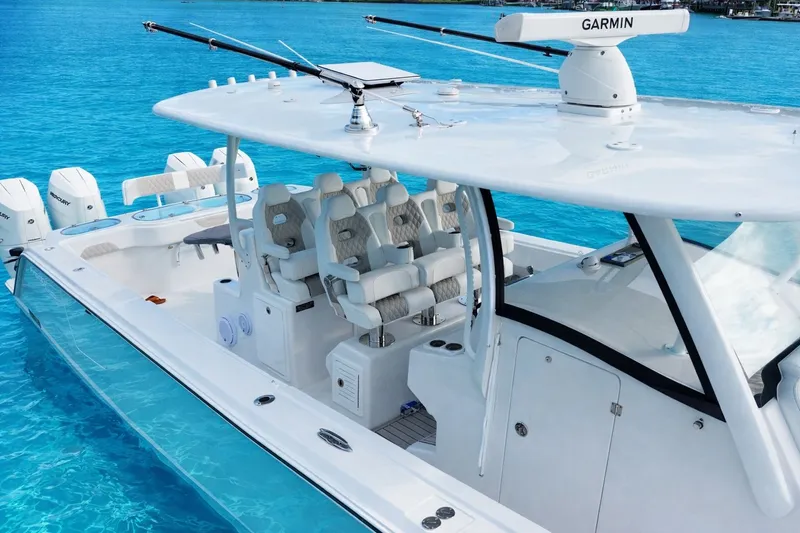 Slide: The Image of Front Runner 43 Catamaran 2026 on clear blue water. - 3