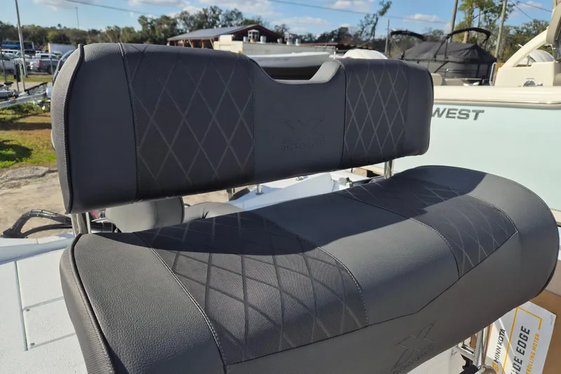 Slide: The Image of 2026 Xpress H20B Bay boat seat with diamond pattern upholstery. - 13