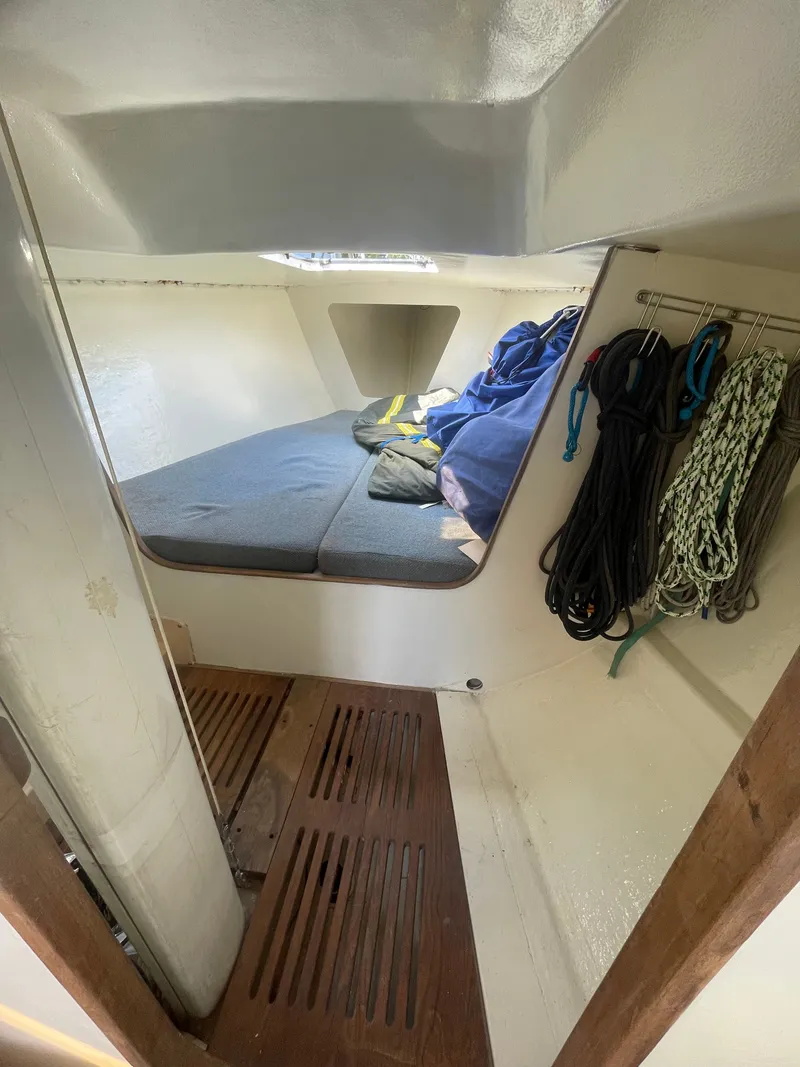 Slide: The Image of Interior of a 1983 J Boats J/35 yacht with sleeping area. - 11