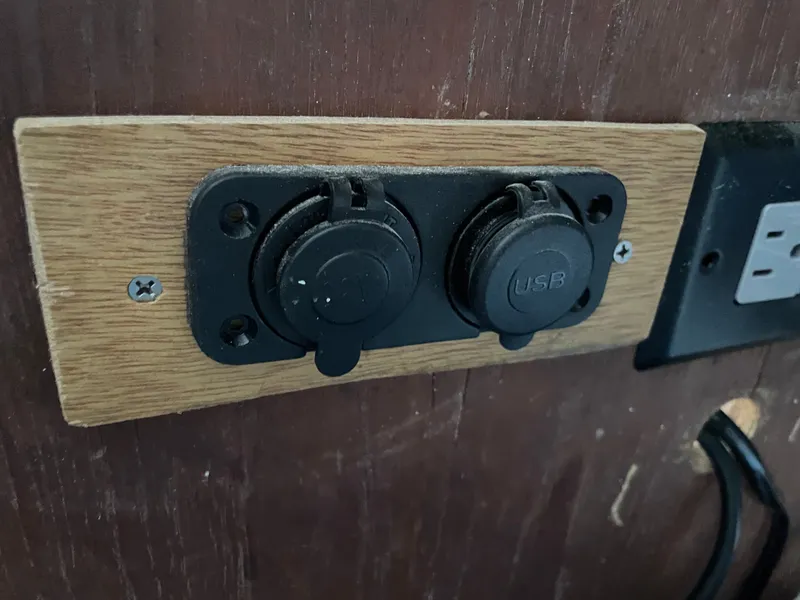 Slide: The Image of USB ports on wooden panel in J Boats J/35, 1983 model. - 22