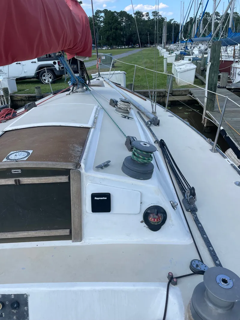 Slide: The Image of 1983 J Boats J/35 sailboat docked at marina. - 8