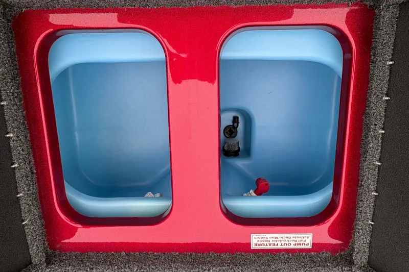 Slide: The Image of Red and blue dual livewell compartments in a 2025 Nitro Z17 boat. - 14