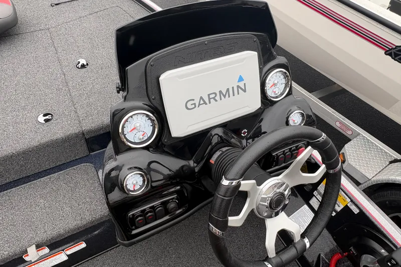 Slide: The Image of Steering console of 2025 Nitro Z17 boat with Garmin display and gauges. - 6