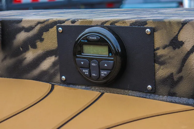 Slide: The Image of 2026 Excel 1754 Shallow Water F4 boat dashboard with audio control panel. - 12