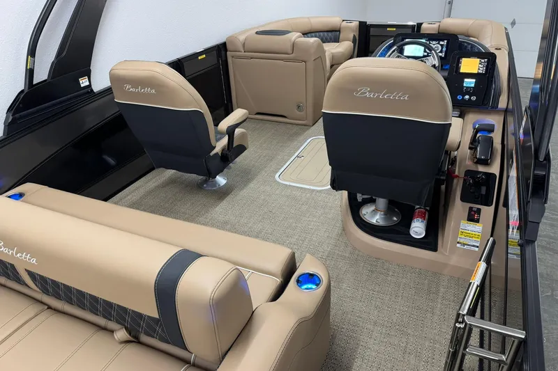 Slide: The Image of 2026 Barletta Lusso 23UCA boat interior with luxurious seating and modern dashboard. - 11
