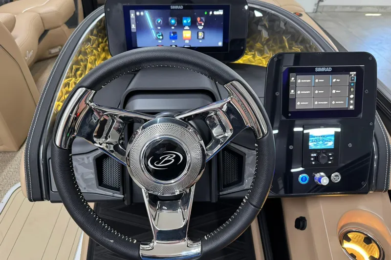 Slide: The Image of 2026 Barletta Lusso 23UCA dashboard with modern steering wheel and dual Simrad displays. - 22
