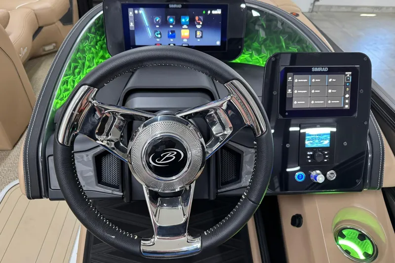 Slide: The Image of 2026 Barletta Lusso 23UCA dashboard with steering wheel and digital displays. - 23
