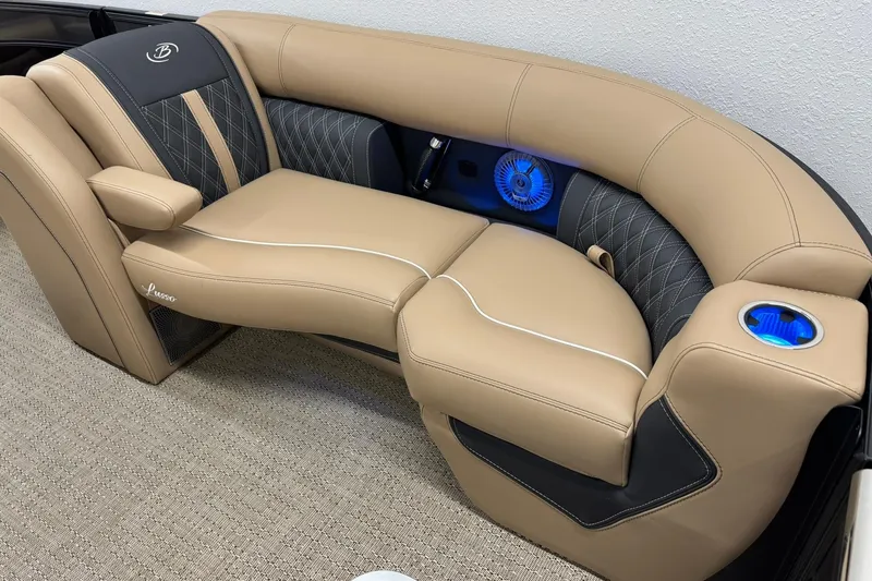 Slide: The Image of Luxurious seating in the 2026 Barletta Lusso 23UCA with elegant design and blue LED cup holders. - 28
