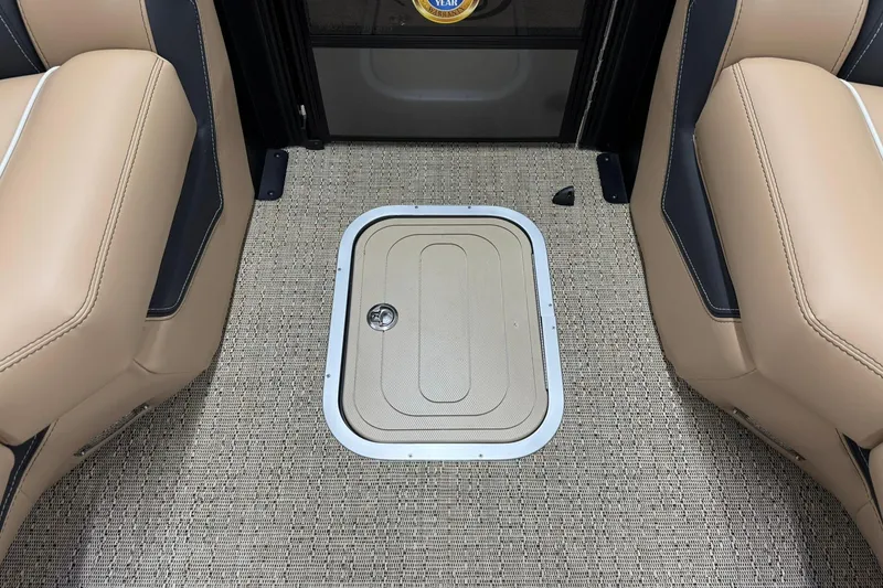 Slide: The Image of 2026 Barletta Lusso 23UCA interior with beige seating and floor hatch. - 31