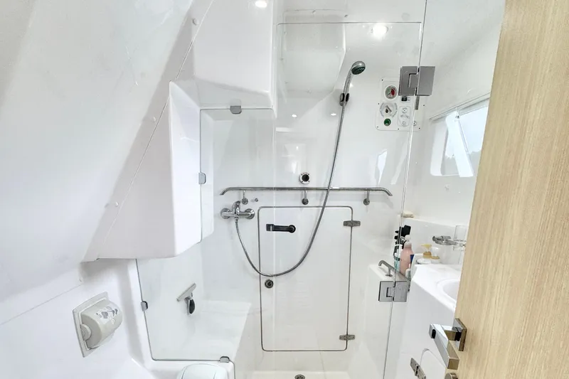 Slide: The Image of Modern bathroom interior of 2023 Seawind 1170 yacht with glass shower enclosure. - 28