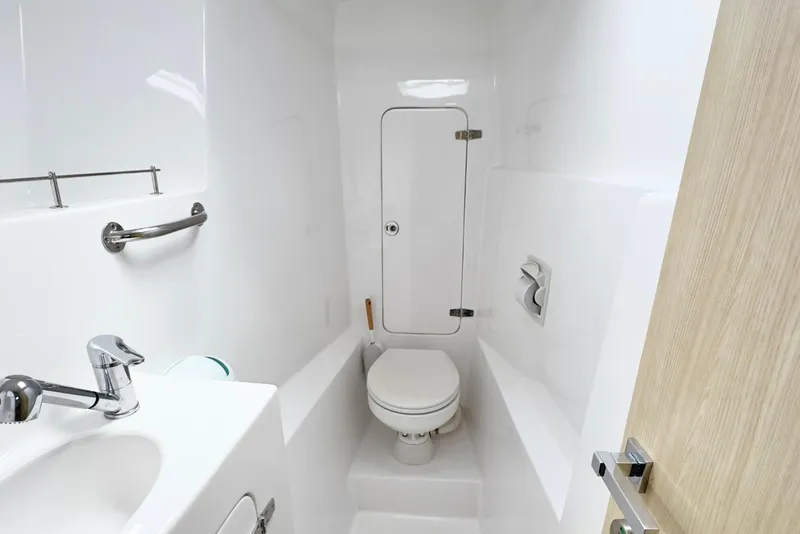 Slide: The Image of Modern bathroom in 2023 Seawind 1170 yacht, featuring sleek fixtures and compact design. - 30