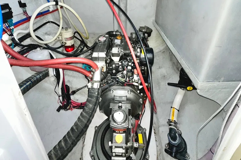 Slide: The Image of Engine compartment of 2023 Seawind 1170, showcasing mechanical components and wiring. - 40