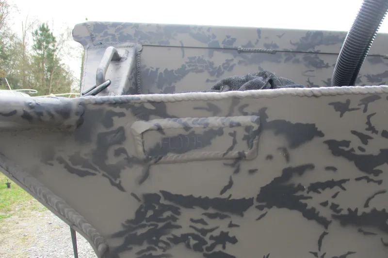 Slide: The Image of 2026 Gator Tail 1754 Extreme boat with camouflage pattern detail. - 11