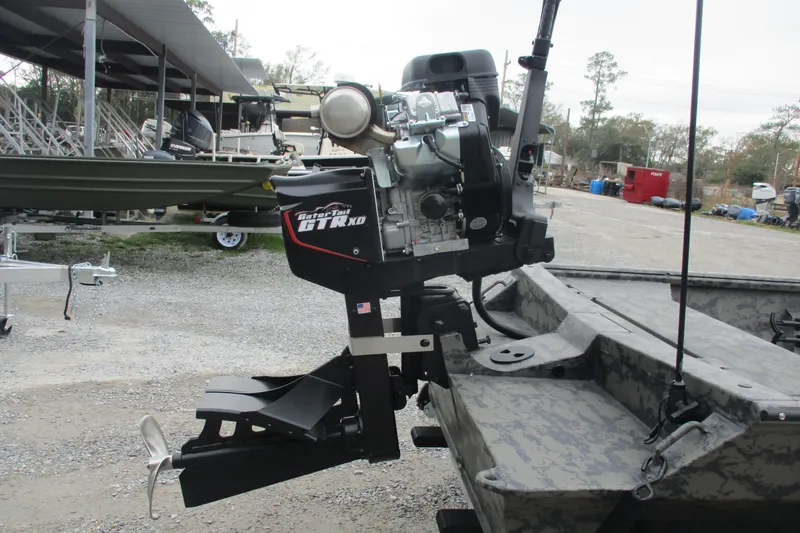 Slide: The Image of 2026 Gator Tail 1754 Extreme boat with powerful outboard motor in a boatyard setting. - 5