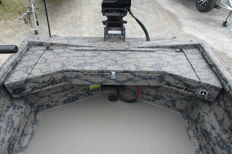 Slide: The Image of 2026 Gator Tail 1754 Extreme boat interior with camo design and storage compartments. - 7