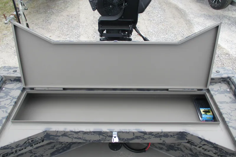 Slide: The Image of Open storage compartment in 2026 Gator Tail 1754 Extreme boat, showing interior space. - 8