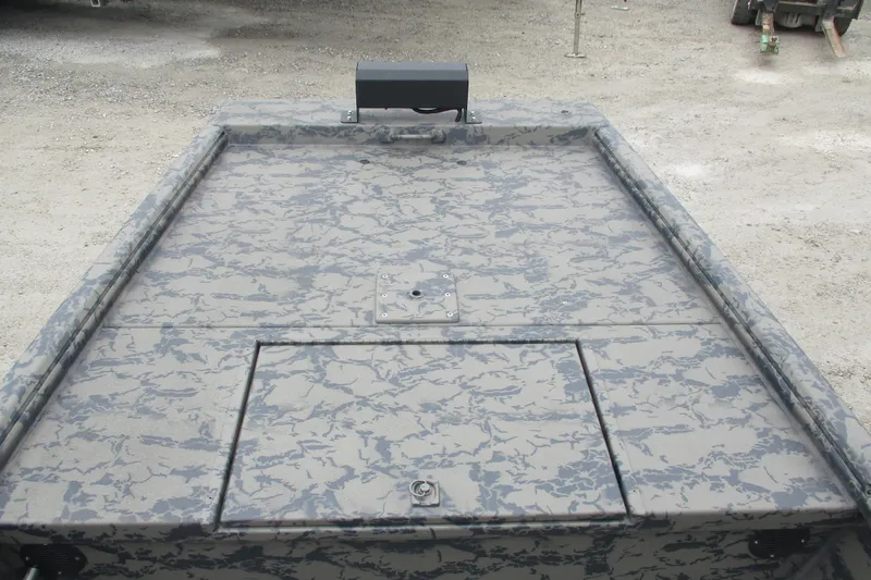 Slide: The Image of 2026 Gator Tail 1754 Extreme boat with camouflage pattern on a gravel surface. - 9