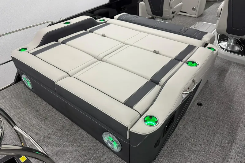 Slide: The Image of Luxurious seating area on 2026 Barletta CORSA 25UC boat with integrated cup holders. - 14