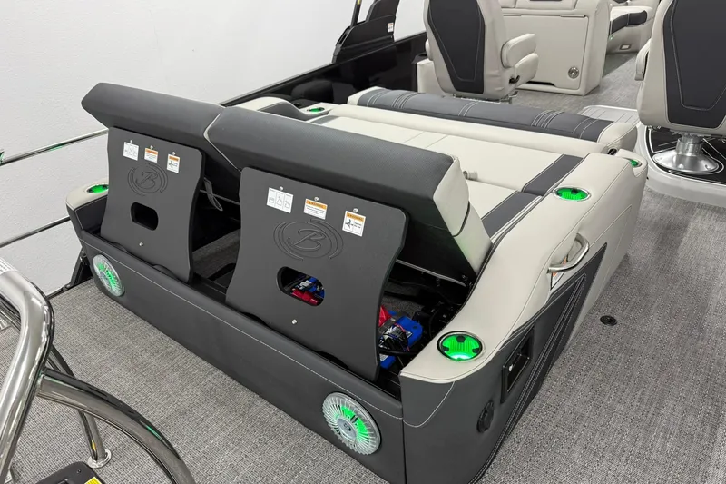 Slide: The Image of 2026 Barletta CORSA 25UC boat interior with adjustable seating and integrated cup holders. - 17