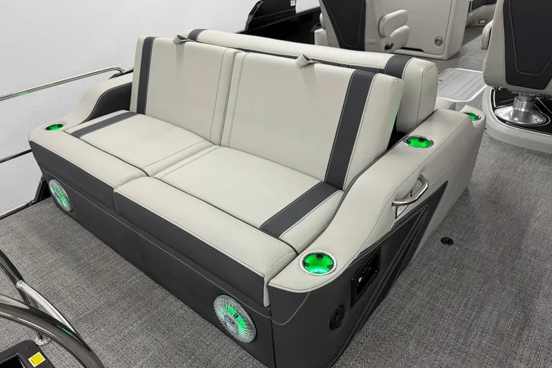 Slide: The Image of Luxurious seating on 2026 Barletta CORSA 25UC boat with integrated cup holders and speakers. - 19