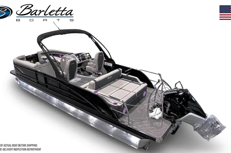 Slide: The Image of 2026 Barletta CORSA 25UC pontoon boat with sleek design and modern features. - 2