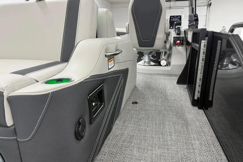 Slide: The Image of Interior of 2026 Barletta CORSA 25UC boat, featuring modern seating and control panel. - 20