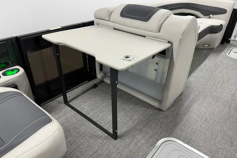 Slide: The Image of 2026 Barletta CORSA 25UC interior with foldable table and luxurious seating. - 32