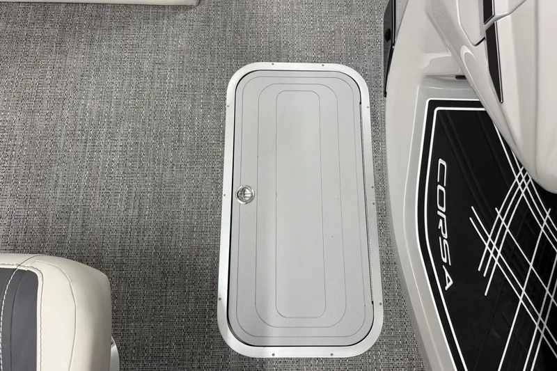Slide: The Image of 2026 Barletta CORSA 25UC boat interior with sleek flooring and storage compartment. - 36