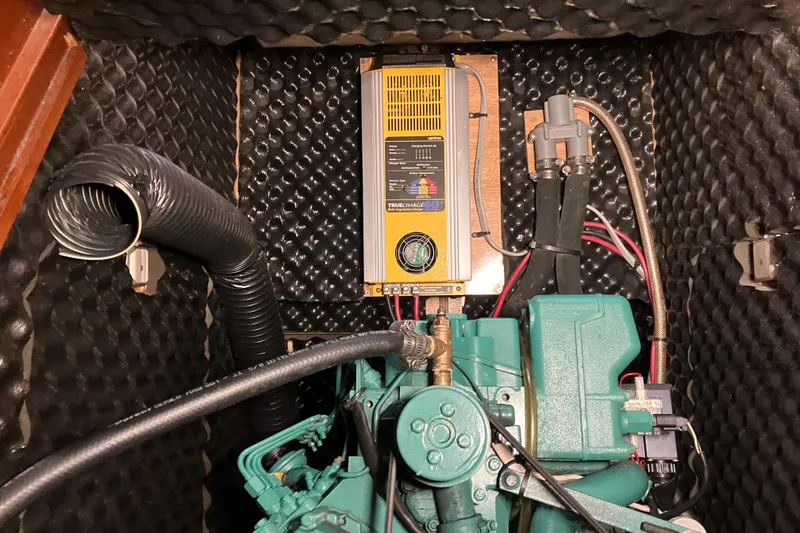 Slide: The Image of Engine compartment of 2005 Beneteau Oceanis 423 with charger and ventilation system. - 30