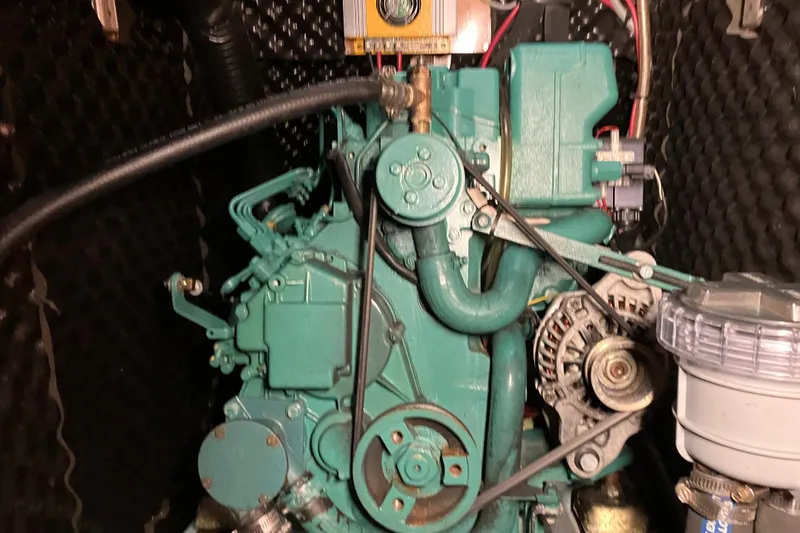 Slide: The Image of Engine of a 2005 Beneteau Oceanis 423 sailboat, showcasing mechanical components. - 29