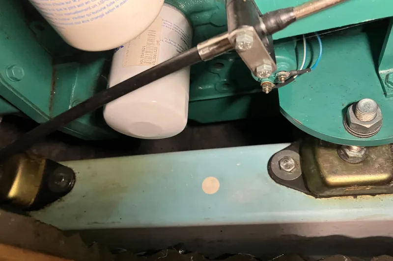 Slide: The Image of Engine compartment of a 2005 Beneteau Oceanis 423 sailboat, showing mechanical components. - 33