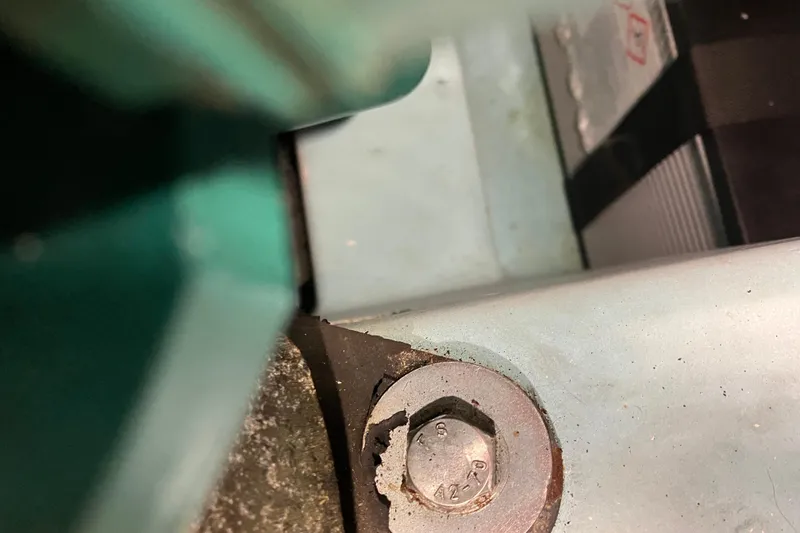 Slide: The Image of Close-up of a bolt on a 2005 Beneteau Oceanis 423 sailboat. - 34